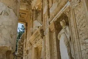 Ephesus Tours from Izmir A Sculpture of woman at the entrance of Celsus Library on full day