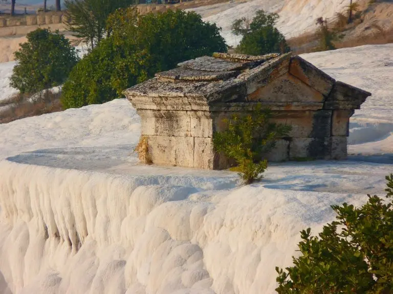 A sarcophagus resides on Pamukkale calcium rocks and terraces at Ephesus and Pamukkale Tour from Istanbul
